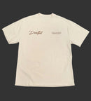 Beige t-shirt with 'Devoted' text on a gray background